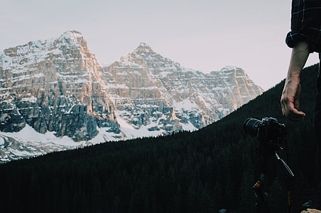 person standing on mountain thumbnail