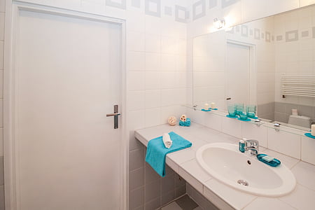 blue towel near sink thumbnail
