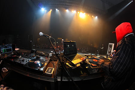 person near DJ controller thumbnail