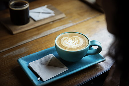 cappuccino in blue ceramic cup thumbnail