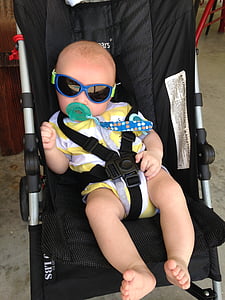 baby sitting on stroller thumbnail