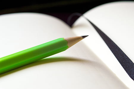 pencil placed on book page thumbnail