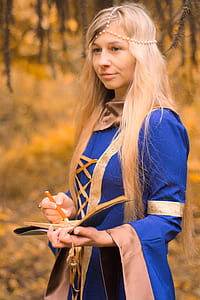 woman holding book and pencil thumbnail