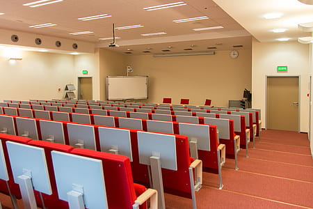red gang chairs inside room thumbnail