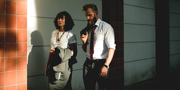 man standing beside woman thumbnail