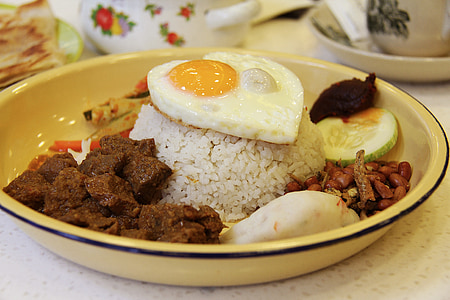 sunny side up egg on top of rice thumbnail