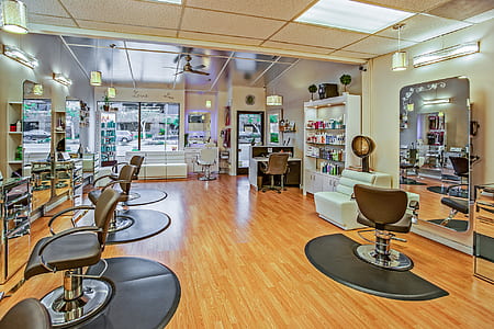 White And Brown Chairs Inside A Salon thumbnail