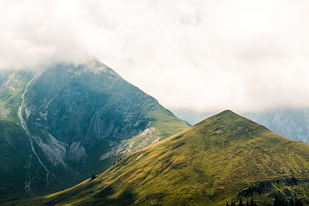 green mountain under clouds thumbnail