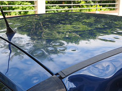 blue car roof with dents thumbnail