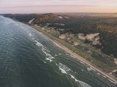 aerial view photography of ocean near seashore thumbnail
