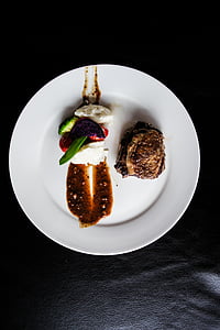 cooked steak and vegetable dish thumbnail