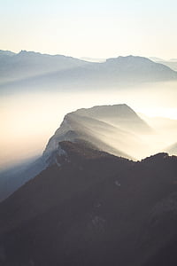 brown mountain with fog thumbnail