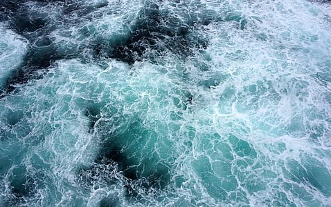 aerial photography of ocean waves thumbnail
