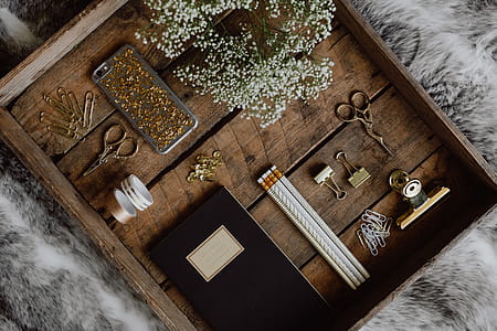 Office accessories on an old wooden tray thumbnail