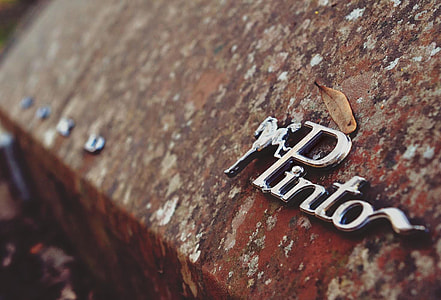 close up shot of chrome Pinto emblem thumbnail