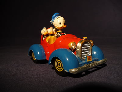 photo of Donald Duck driving vehicle figurine thumbnail