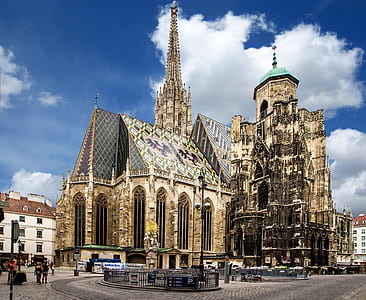 brown and black cathedral during daytime thumbnail