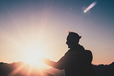 Silhouette of Man during Sunset thumbnail
