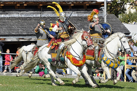 person riding on white running horse thumbnail