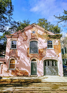 front view of pink concrete building thumbnail