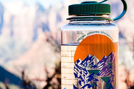 selective focus photo of clear plastic tumbler filled with water thumbnail