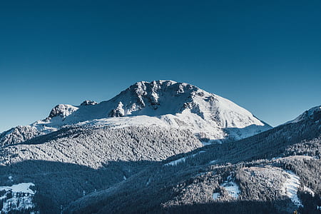 mountain covered by snow at daytime thumbnail