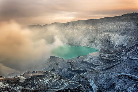 landmark photography of body of water surrounded by gray cliff thumbnail