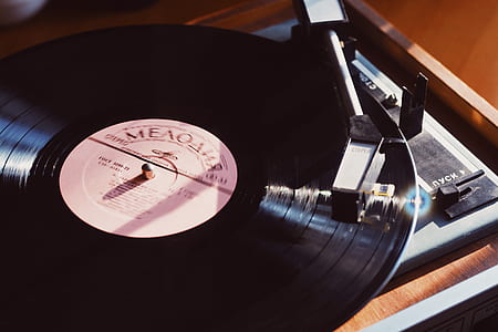 vinyl record playing on turntable thumbnail