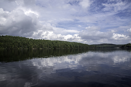 Clouds, lake, water, and trees at Algonquin Provincial Park, Ontario thumbnail