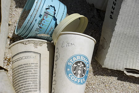 two white disposable coffee cups thumbnail