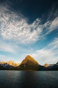mountain near body of water thumbnail