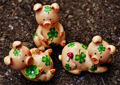 three pig ceramic figurines on ground thumbnail