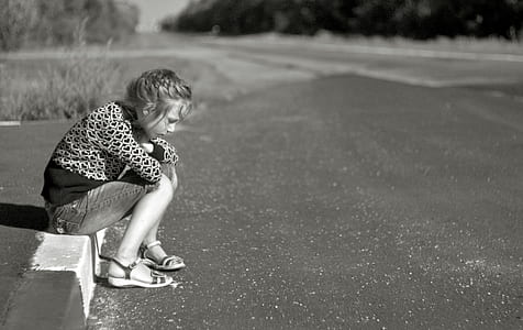 woman wearing black and white long-sleeved shirt photography thumbnail