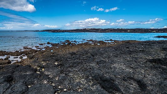 beach shore under blue sky thumbnail