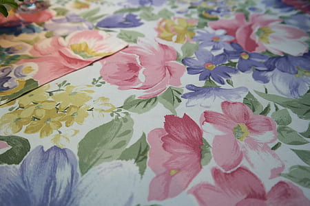 white, pink, and purple floral textile thumbnail