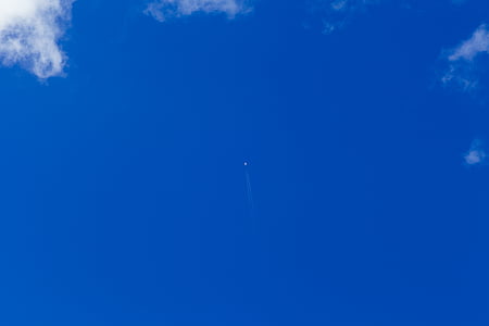white plane up in sky thumbnail