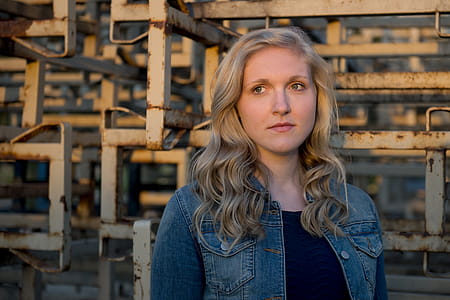 Woman Wearing Blue Denim Jacket thumbnail
