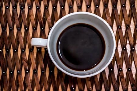 black liquid on white ceramic mug thumbnail