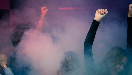 woman raising hand thumbnail