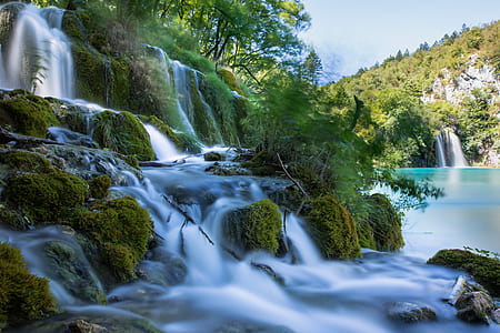 time-lapse photo of waterfall during daytime thumbnail
