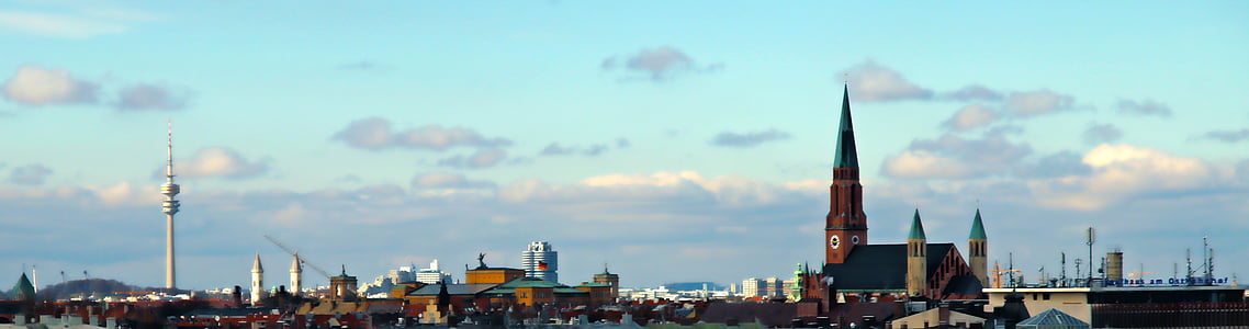 panoramic photography of city under clear blue sky thumbnail