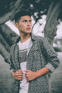 man near tree bokeh photography thumbnail