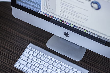 turned on Apple iMac and Wireless Keyboard thumbnail