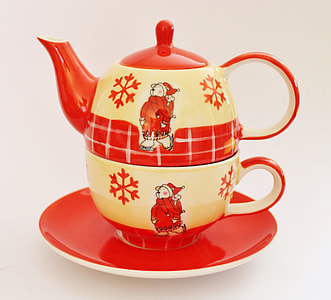 red and white ceramic teapot thumbnail