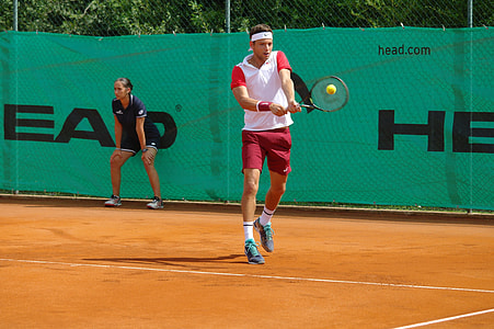 Man Hitting a Volley Shot in Tennis thumbnail