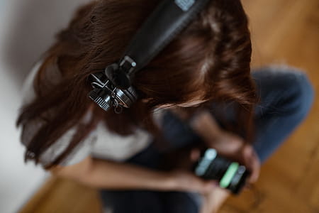 Beautiful young woman in headphones listening to music thumbnail