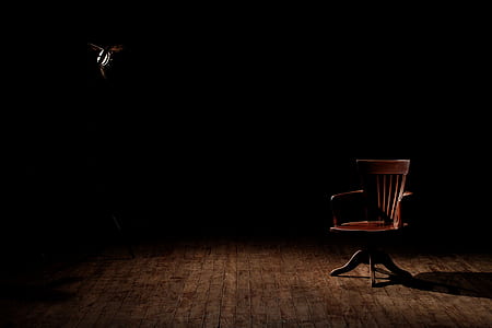 Brown Wooden Armchair on Brown Wooden Floor thumbnail