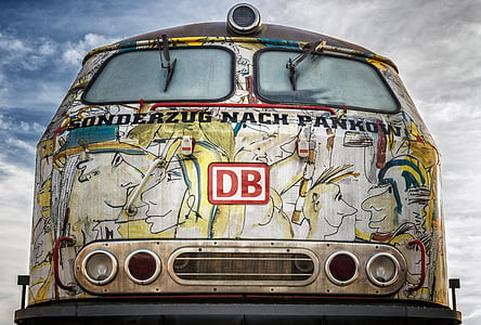 photo of gray multicolored van front view thumbnail