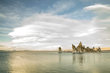 stone formation in the middle of sea thumbnail