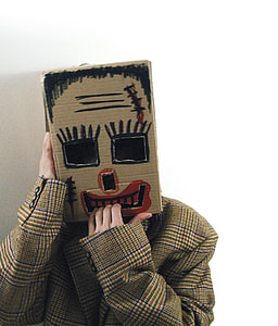 person wearing cardboard box head costume thumbnail